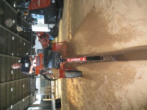 Gary Lawson of Ditch Witch demonstrates a walk-behind trenching machine.